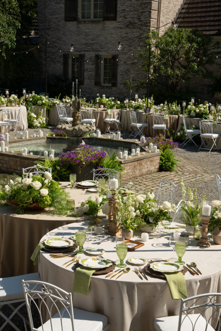 Chicago suburbs wedding designer outdoor reception with floral arrangements and stone terrace event design and production HMR Designs