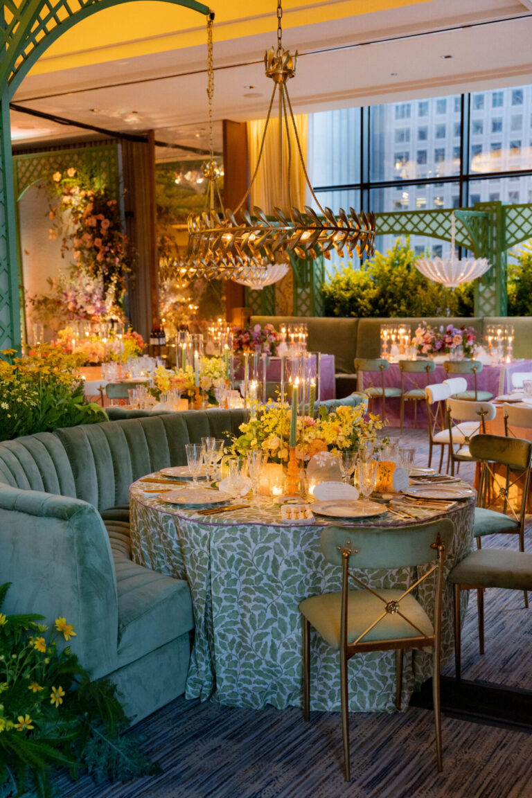 Wedding Designer elegant reception table with pastel florals and chandeliers event design and production HMR Designs