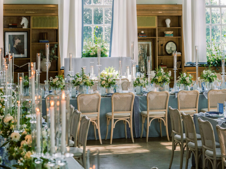 Elegant Chicago wedding design reception with candlelight and white floral centerpieces Rishi Patel