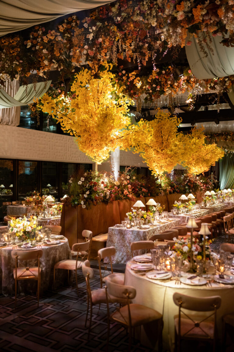 Chicago wedding designer intimate dinner reception beneath suspended autumn foliage event design company HMR Designs