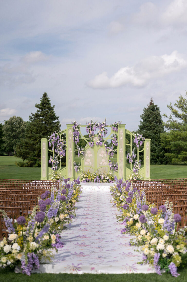 Outdoor wedding design ceremony with lavender and white floral-lined aisle event designer HMR Designs