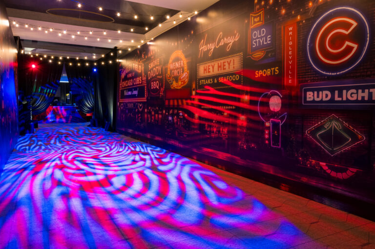 Chicago bar mitzvah design featuring Chicago sports graphics, stadium lighting and a colorful dance floor by event design and production company HMR Designs Mal Marencik