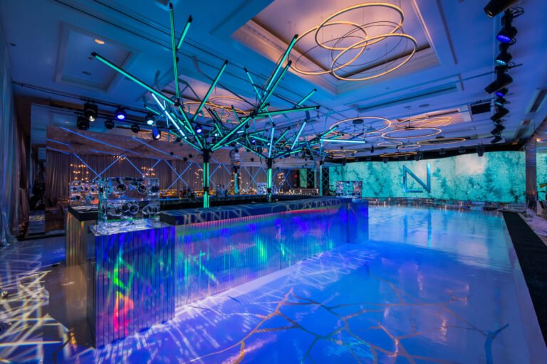 Chicago bar mitzvah design featuring a reflective dance floor, geometric lighting and custom suspended décor by event design and production company HMR Designs