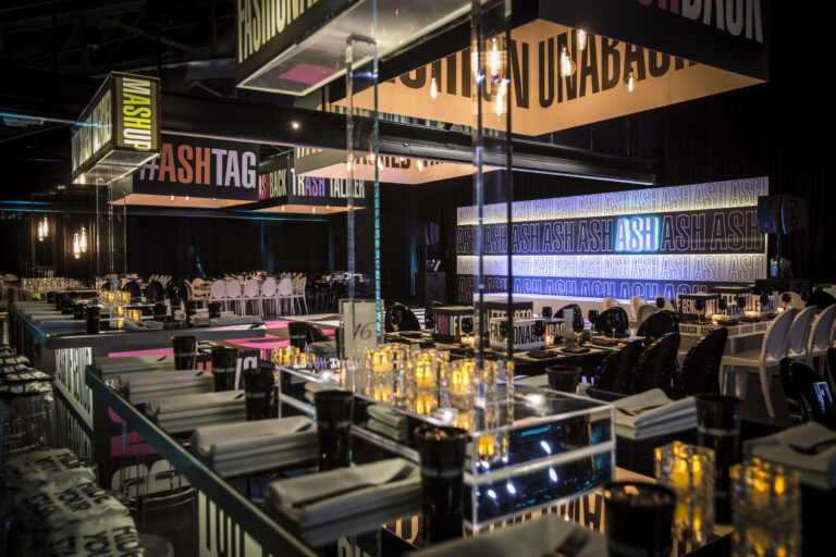 Chicago suburbs bar mitzvah design featuring a custom sports stage and branded stadium-inspired décor by event design company HMR Designs