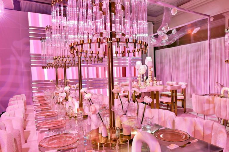Chicago bat mitzvah designer Rishi Patel created a pink celebration with suspended florals and crystal chandeliers for HMR Designs