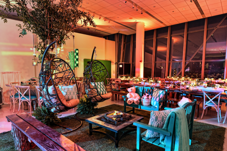 Chicago bat mitzvah design featuring tropical décor, custom lounge seating and warm sunset-inspired lighting by HMR Designs